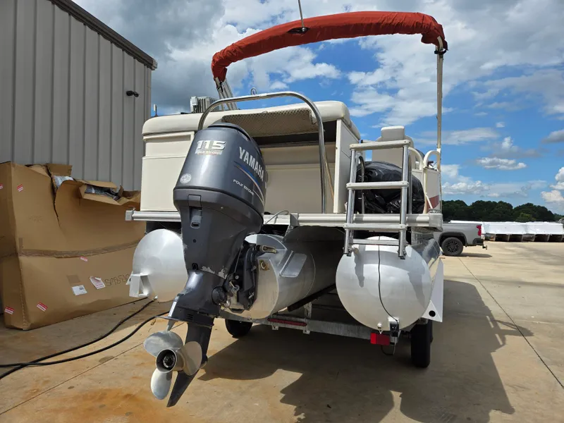 Slide: The Image of 2008 Starcraft Elite 226 RE CR pontoon boat with Yamaha 115 outboard motor. - 19