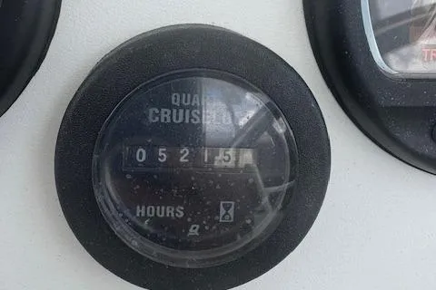 Slide: The Image of Hour meter reading 521.5 hours on 1997 Stamas 310 Express boat. - 15