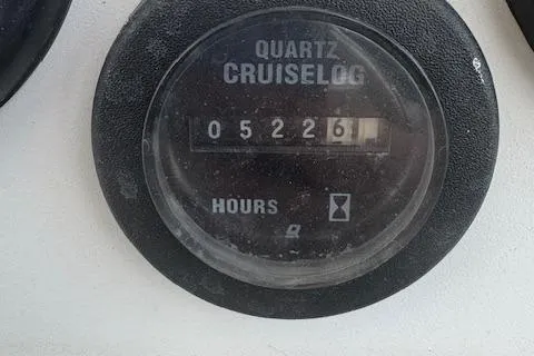 Slide: The Image of Quartz cruiselog hour meter showing 5226 hours on a 1997 Stamas 310 Express. - 16