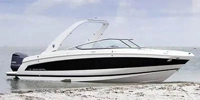 Slide: The Image of 2020 Regal 26 OBX boat on a sandy beach with calm waters. - 10