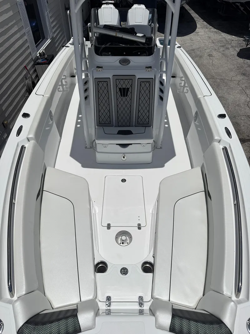 Slide: The Image of 2025 Wellcraft 242 Fisherman boat interior with seating and console. - 25