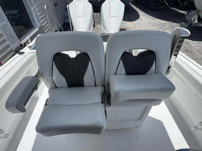 Slide: The Image of 2025 Wellcraft 242 Fisherman boat seats with armrests and modern design. - 28