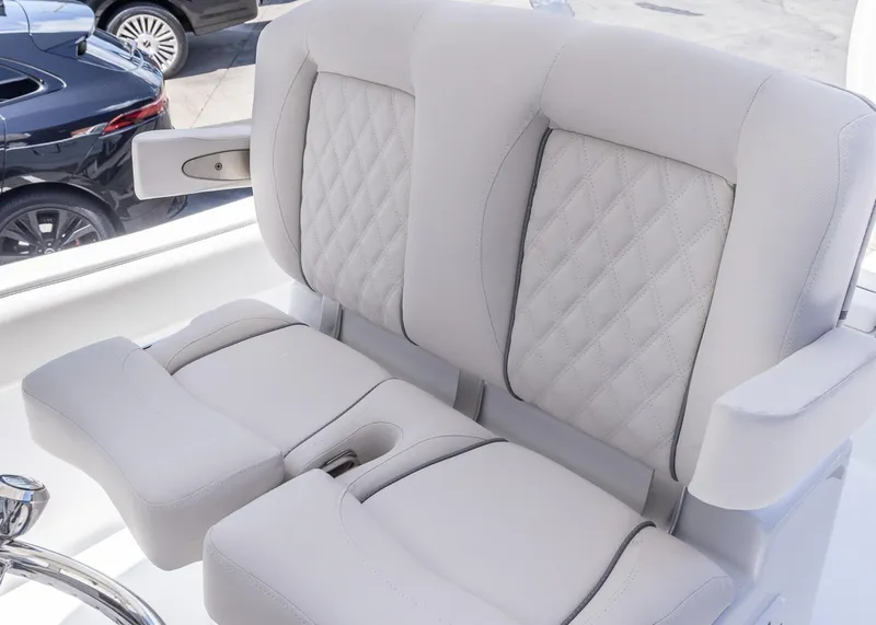Slide: The Image of Luxurious seating on 2026 Sea Hunt Ultra 235 SE boat with quilted upholstery. - 9
