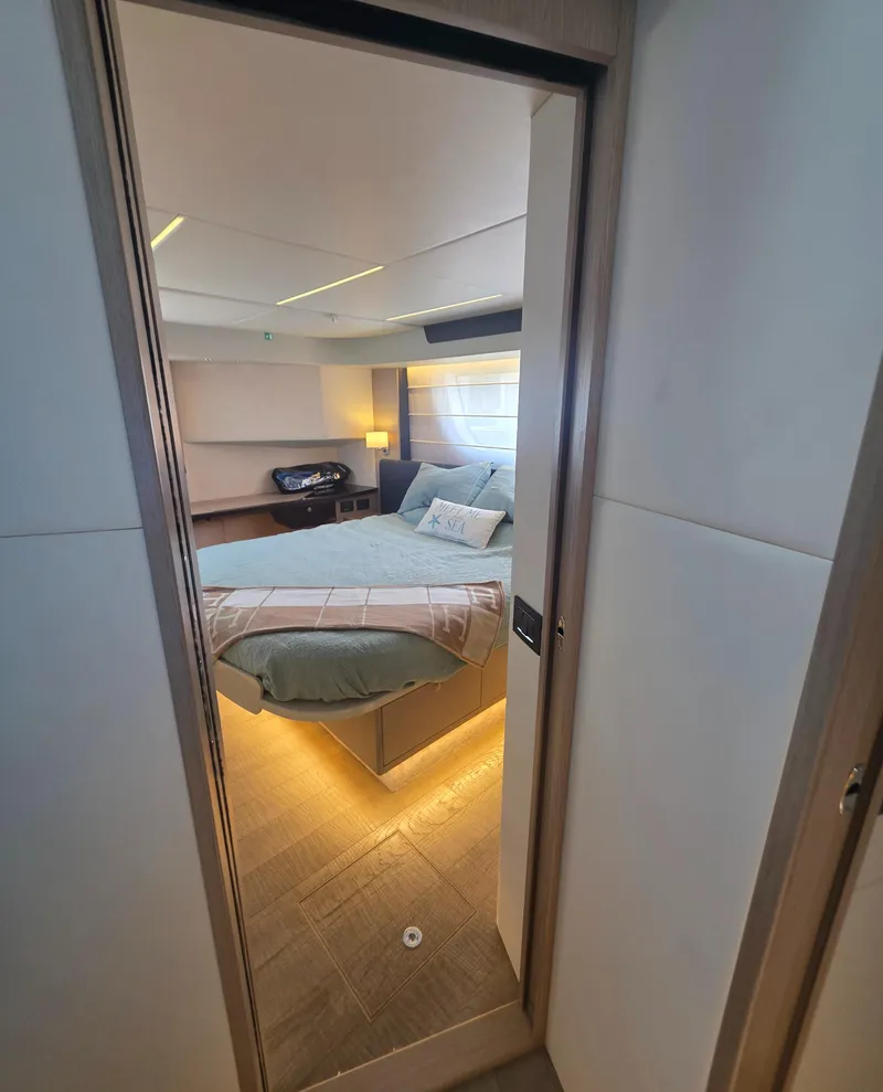 Slide: The Image of Luxurious bedroom interior of 2021 Absolute 47 Fly yacht with modern design. - 14