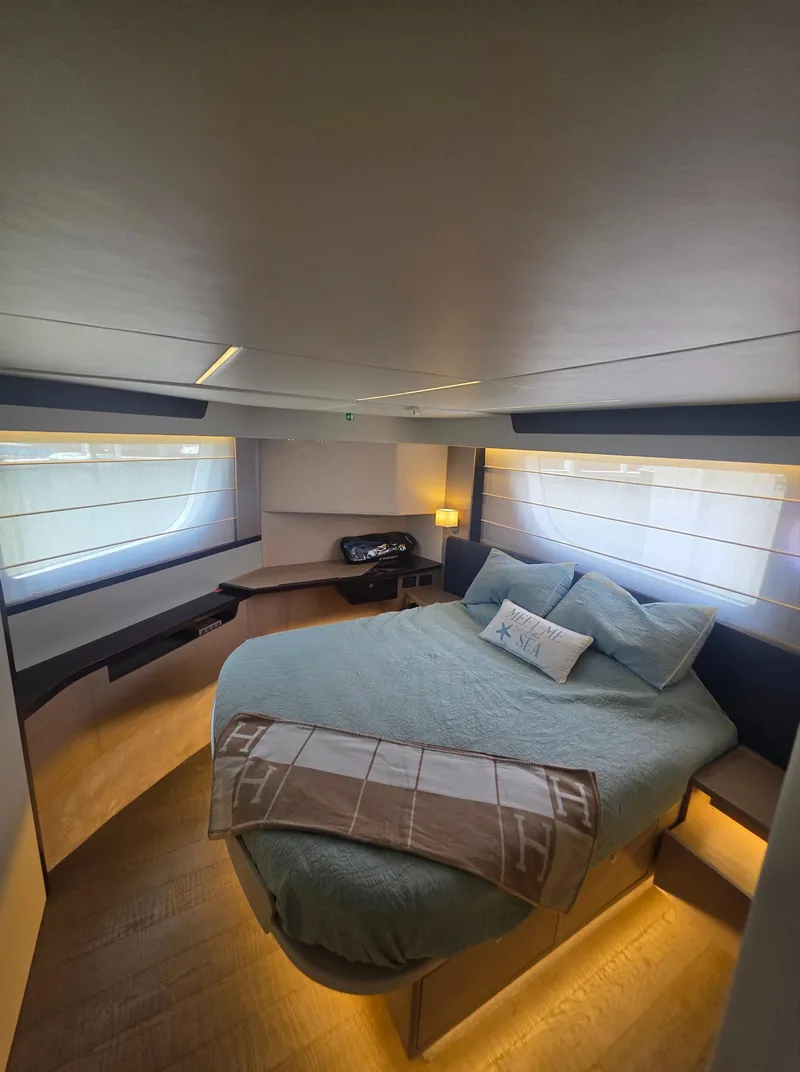 Slide: The Image of Luxurious bedroom interior of 2021 Absolute 47 Fly yacht with modern design and cozy bedding. - 16