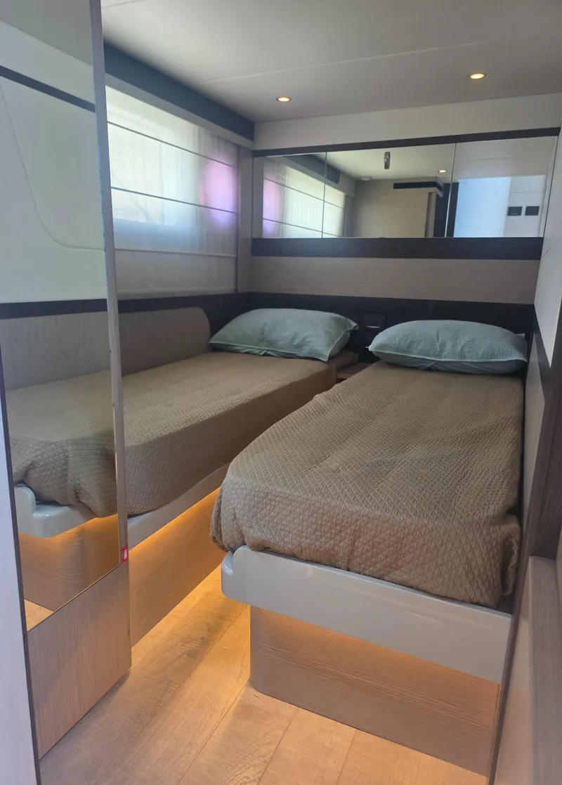 Slide: The Image of Interior of 2021 Absolute 47 Fly yacht with twin beds and modern design. - 23