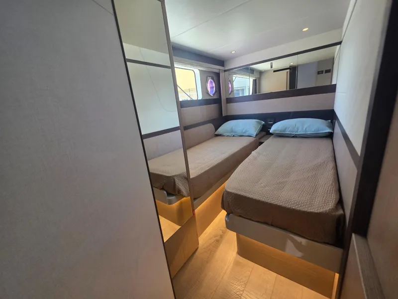 Slide: The Image of Interior of 2021 Absolute 47 Fly yacht with twin beds and modern design. - 25