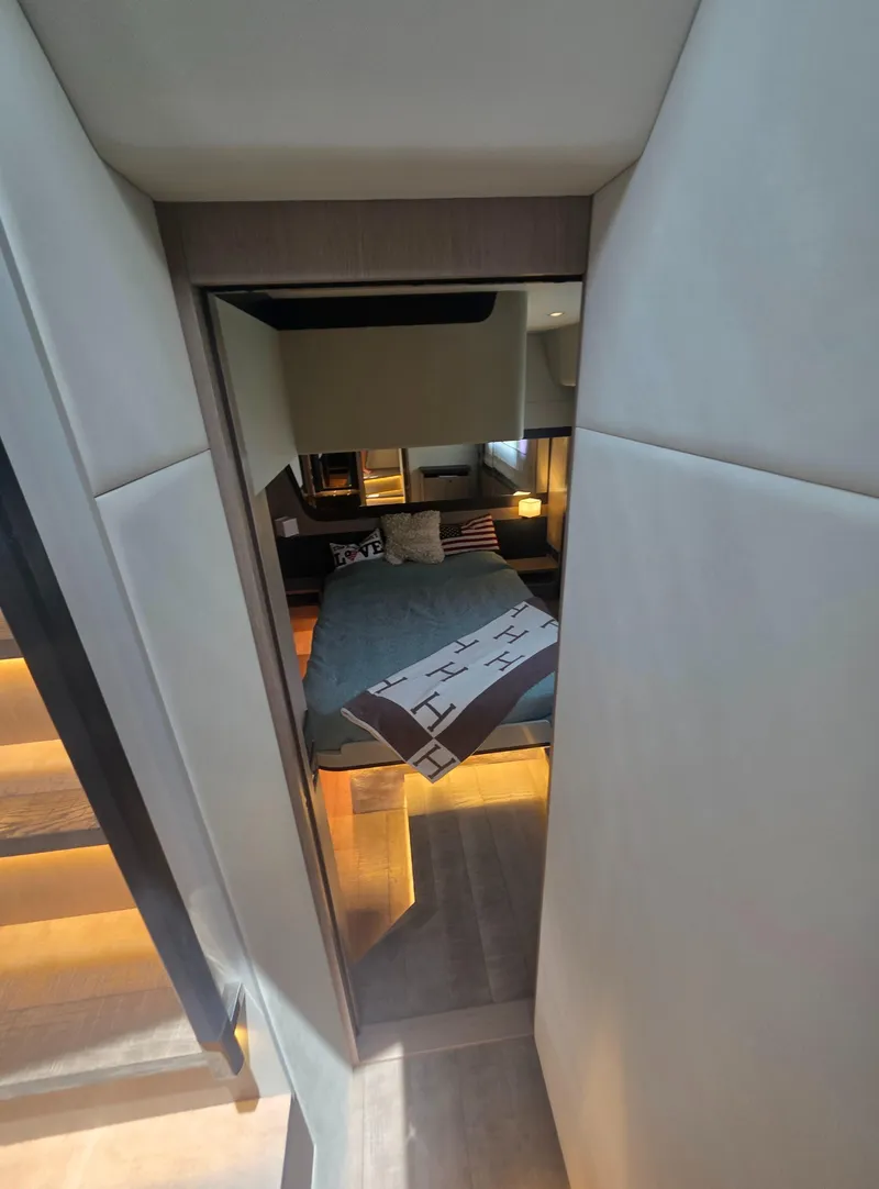 Slide: The Image of Interior view of a 2021 Absolute 47 Fly yacht bedroom with modern design. - 30