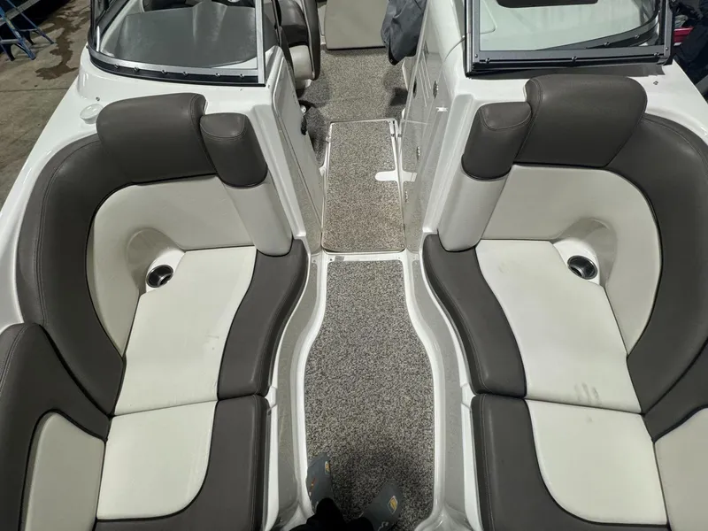 Slide: The Image of 2011 Yamaha Boats 242 Limited interior with gray and white seating. - 17