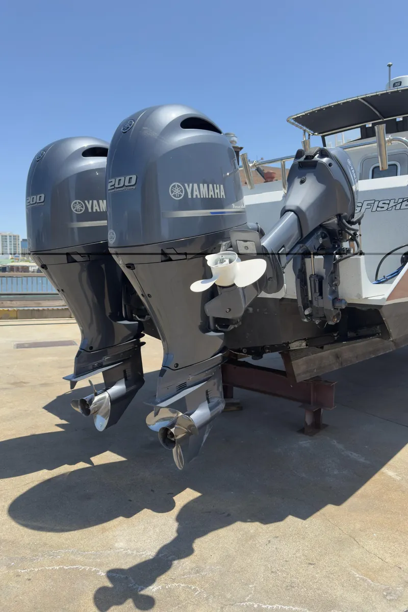 Slide: The Image of Twin Yamaha 200 outboard motors on a 2016 KingFisher 3025 Destination boat. - 30