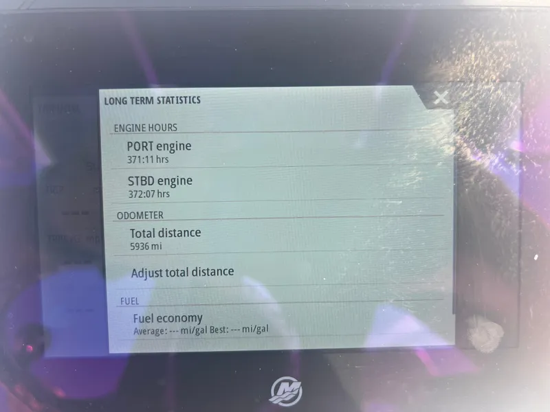 Slide: The Image of Display showing engine hours and odometer for 2021 Contender 32 ST boat. - 13