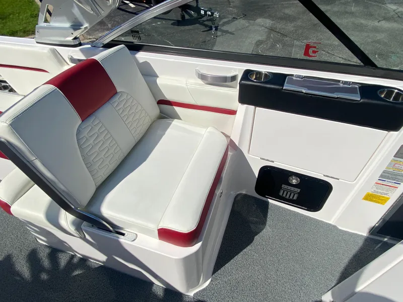 Slide: The Image of 2020 MasterCraft X26 boat interior with white and red seating. - 23
