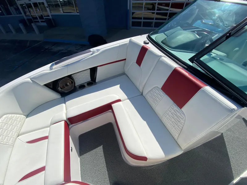 Slide: The Image of 2020 MasterCraft X26 boat interior with white and red seating. - 34