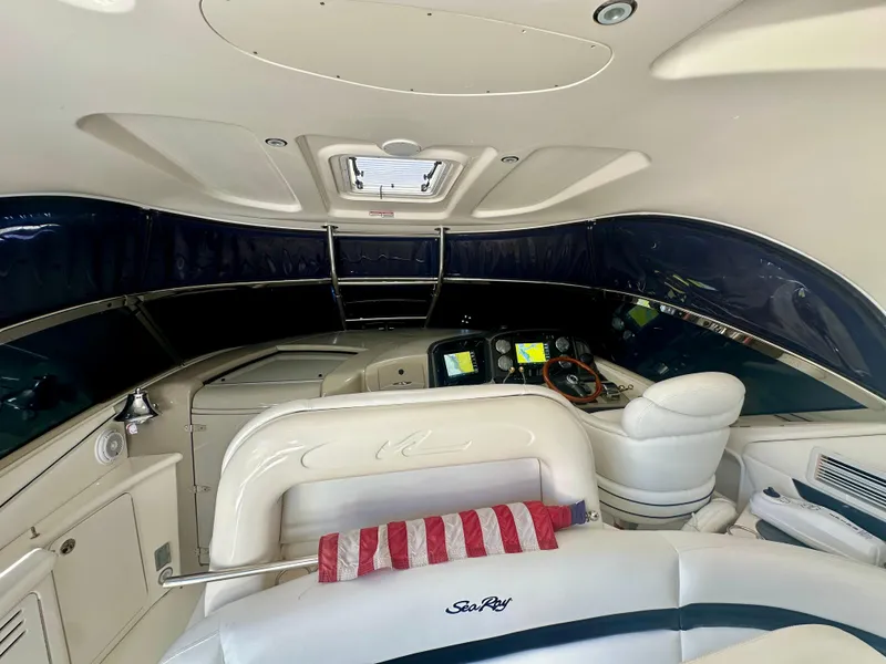 Slide: The Image of Interior view of 2005 Sea Ray 420 Sundancer yacht cockpit with navigation equipment. - 28