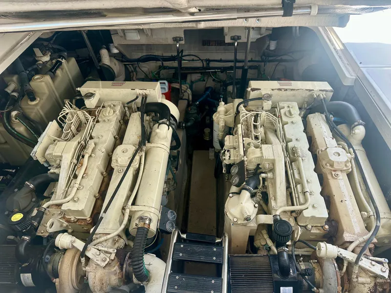 Slide: The Image of Engine room of a 2005 Sea Ray 420 Sundancer with dual engines. - 29