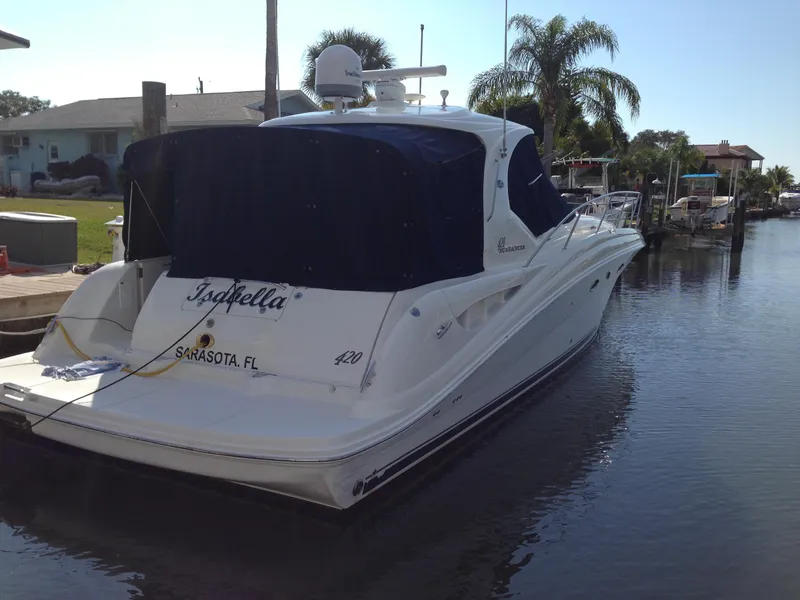 Slide: The Image of 2005 Sea Ray 420 Sundancer yacht docked in Sarasota, Florida canal. - 4