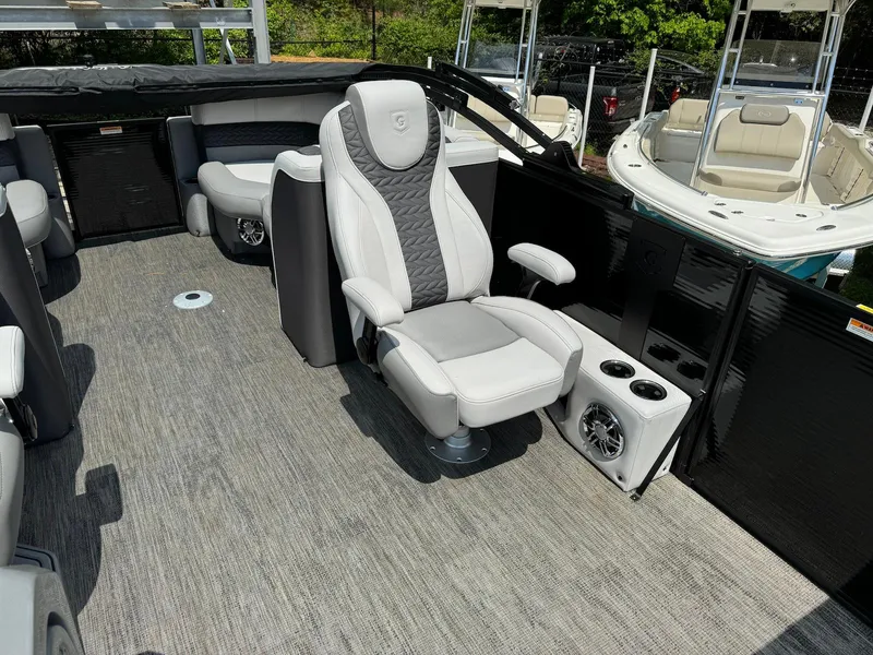Slide: The Image of Captain's chair in 2024 Godfrey Monaco 235 SB pontoon boat cockpit. - 15