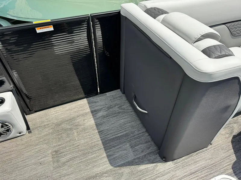 Slide: The Image of Dashboard of 2024 Godfrey Monaco 235 SB with Garmin display and gauges. - 16