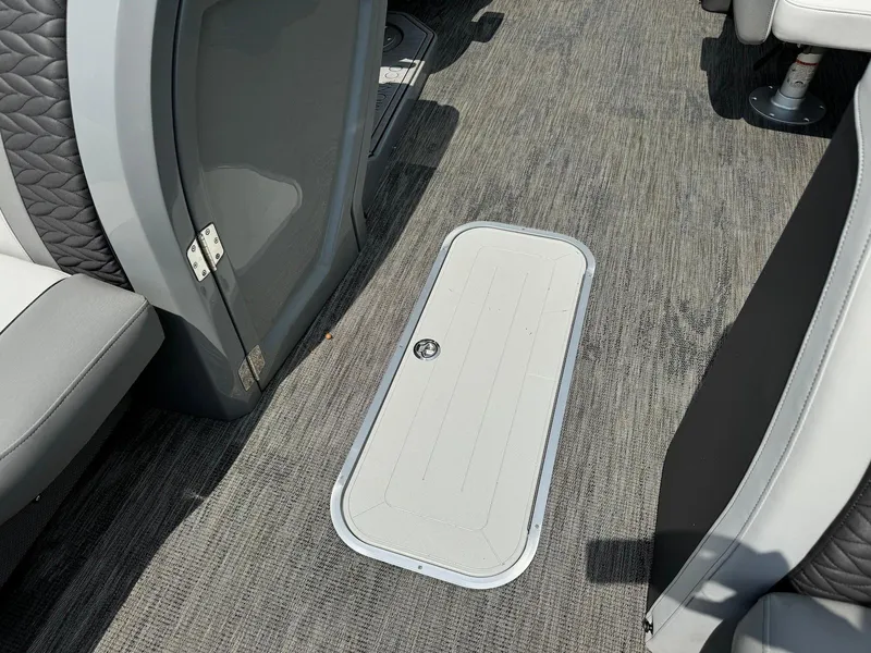 Slide: The Image of Control panel on 2024 Godfrey Monaco 235 SB with chilled cupholder and canopy switches. - 18