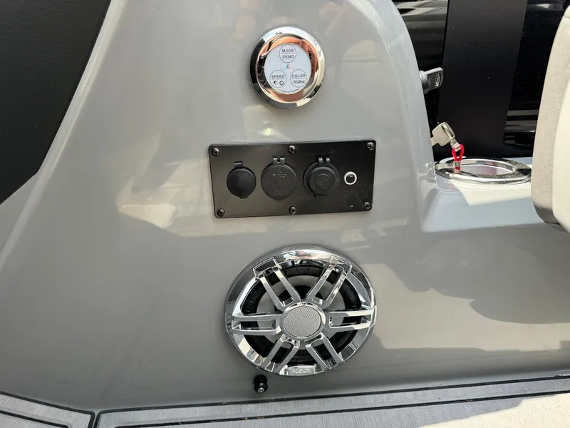 Slide: The Image of 2024 Godfrey Monaco 235 SB dashboard with Fusion audio system and control panel. - 22