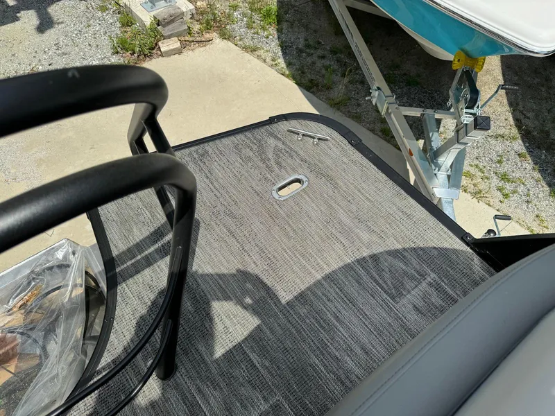 Slide: The Image of 2024 Godfrey Monaco 235 SB interior storage compartments with sleek design and modern finish. - 23