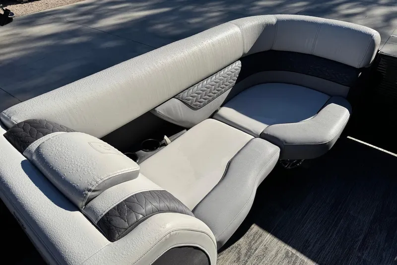 Slide: The Image of Luxurious seating on 2024 Godfrey Monaco 235 SB pontoon boat, featuring elegant upholstery design. - 27