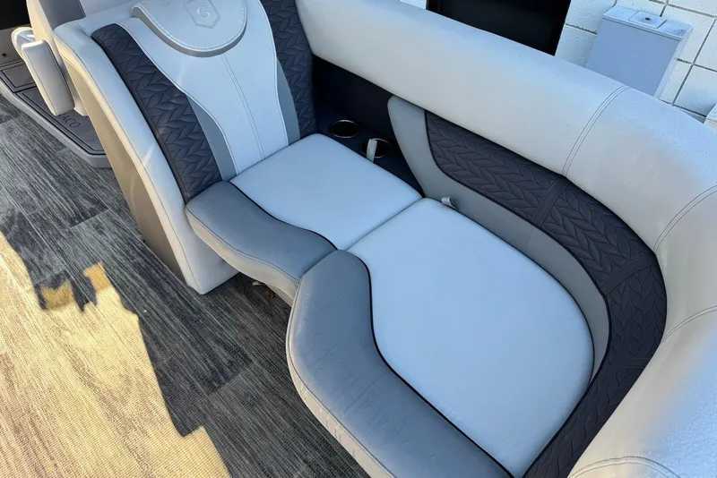Slide: The Image of Luxurious seating on 2024 Godfrey Monaco 235 SB boat, featuring elegant design and comfort. - 29