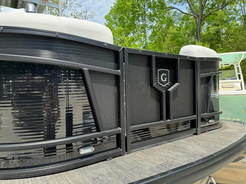 Slide: The Image of 2024 Godfrey Monaco 235 SB boat engine with "250" emblem, ultra-low emission. - 3