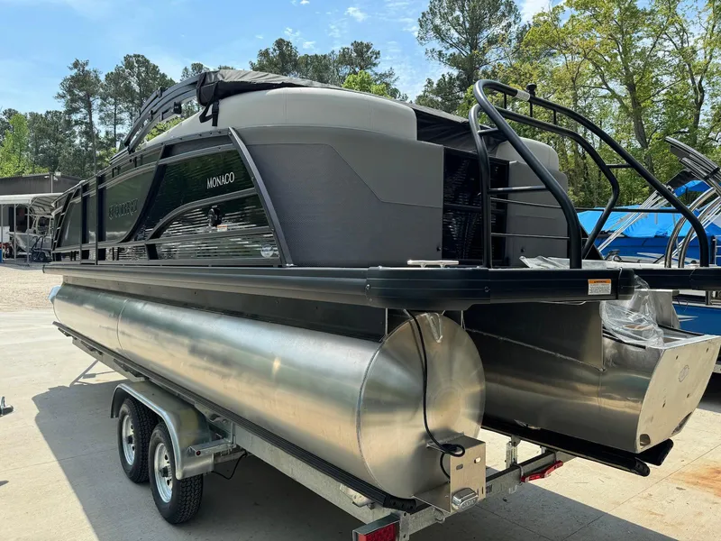 Slide: The Image of 2024 Godfrey Monaco 235 SB pontoon boat with Yamaha outboard motor and ladder. - 4