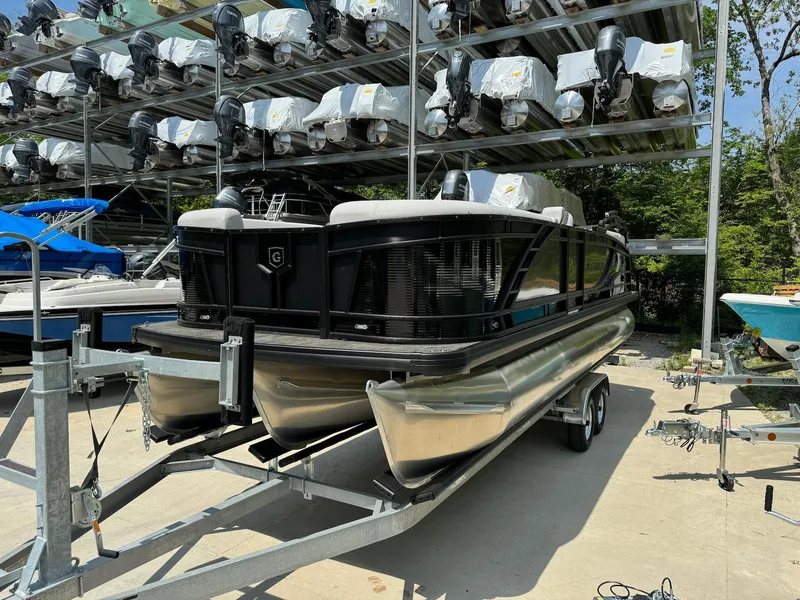 Slide: The Image of 2024 Godfrey Monaco 235 SB boat seating with elegant gray upholstery and quilted design. - 5