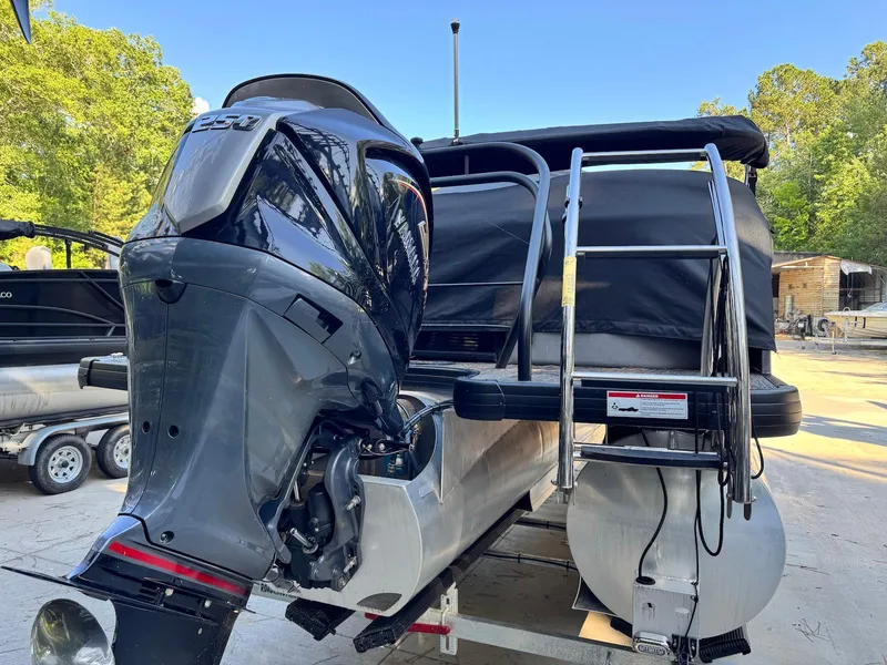 Slide: The Image of Luxurious seating on 2024 Godfrey Monaco 235 SB pontoon boat, featuring elegant design and comfort. - 7