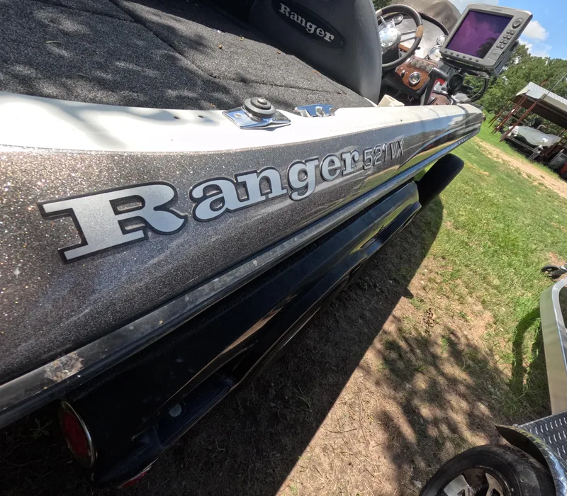 Slide: The Image of 2006 Ranger 521DVX Comanche boat with detailed interior and electronics. - 4