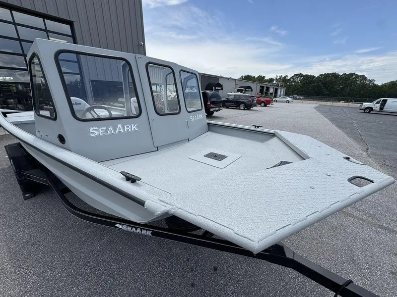 Slide: The Image of 2026 SeaArk 2072 MV Flat Cat boat displayed outdoors, showcasing its spacious deck and modern design. - 4