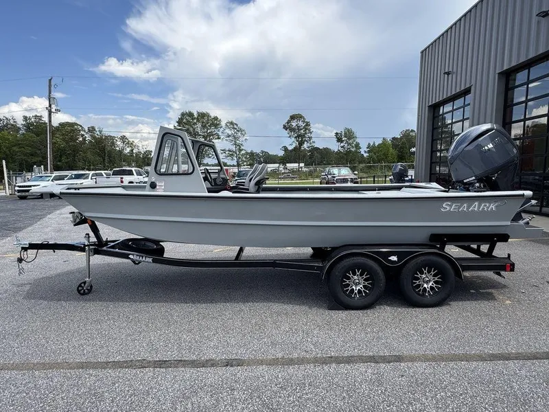 Slide: The Image of 2026 SeaArk 2072 MV Flat Cat boat on trailer, parked outdoors. - 5