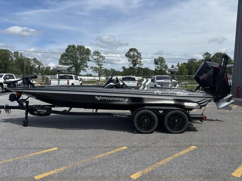 Slide: The Image of 2026 Phoenix 921 Elite X II boat on trailer in parking lot. - 0