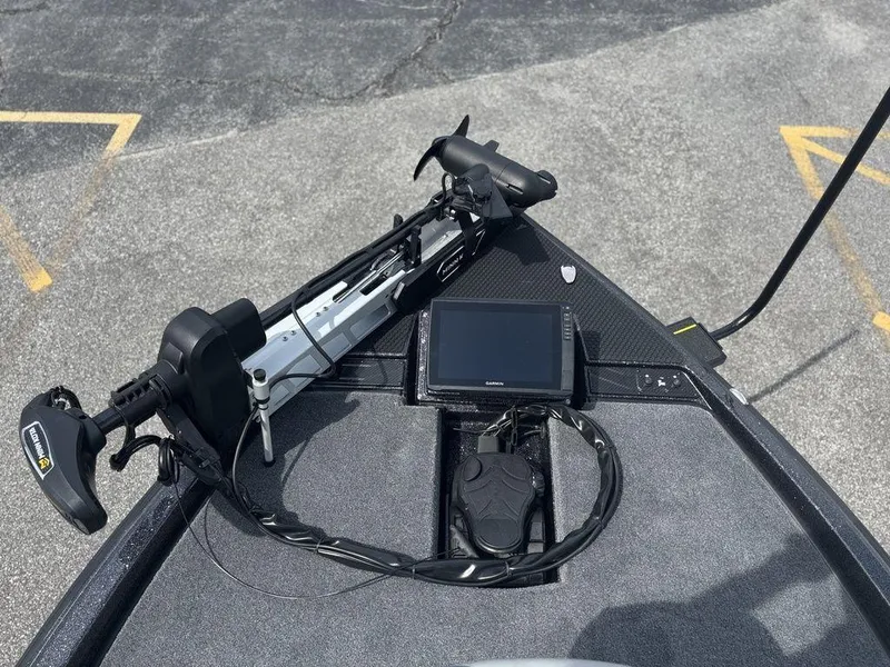 Slide: The Image of Front deck of 2026 Phoenix 921 Elite X II with trolling motor and Garmin display. - 23