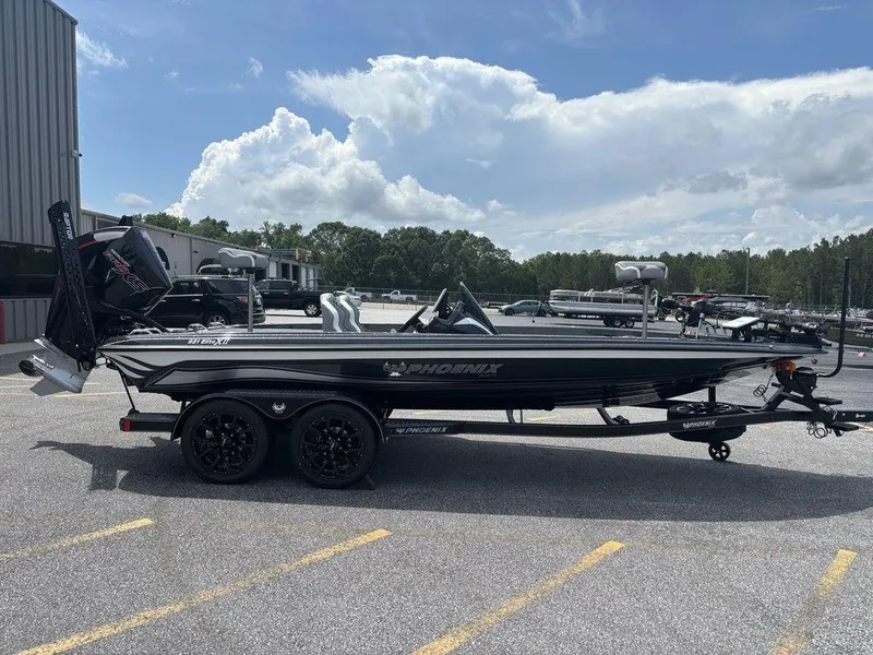 Slide: The Image of 2026 Phoenix 921 Elite X II boat on trailer in parking lot. - 7