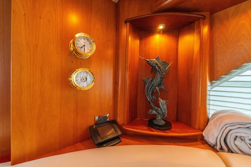Slide: The Image of Luxurious 2002 Queenship 98 Yachtfish interior with nautical decor and elegant wood finish. - 14