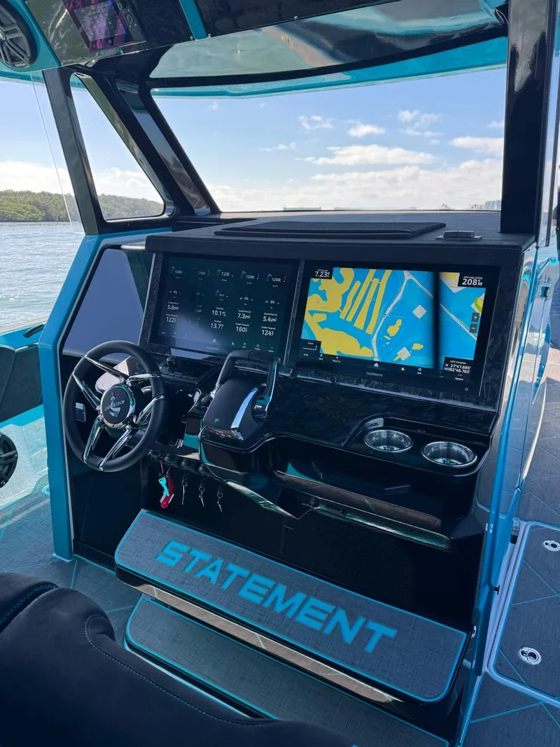 Slide: The Image of Interior of 2026 Statement 430 Tigress Center Console Catamaran with advanced navigation system. - 12