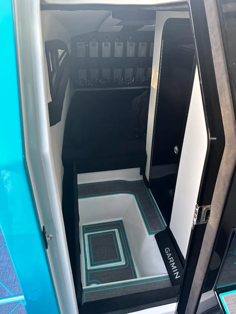 Slide: The Image of Interior of 2026 Statement 430 Tigress Catamaran with modern design and Garmin equipment. - 13