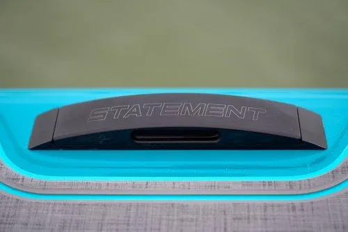 Slide: The Image of Statement 430 Tigress Center Console Catamaran 2026, sleek design detail, turquoise and gray accents. - 18