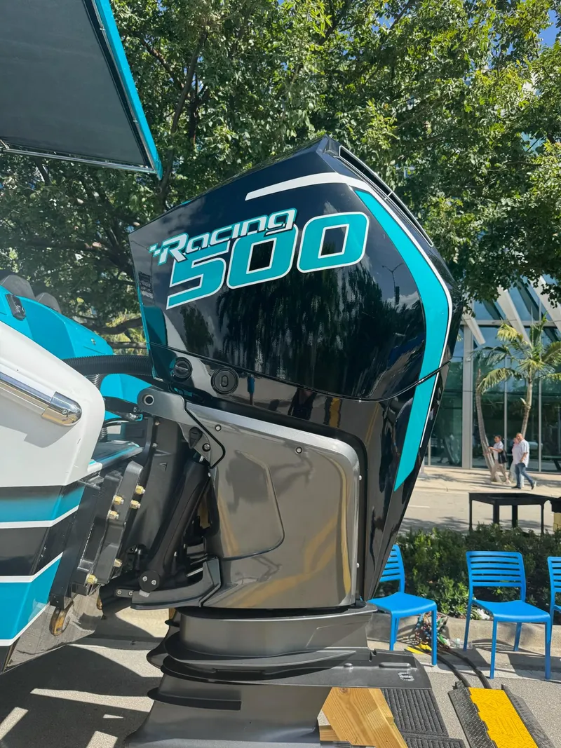 Slide: The Image of Powerful Racing 500 engine on 2026 Statement 430 Tigress Catamaran, outdoor display. - 4