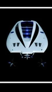 Slide: The Image of 2012 Mystic Powerboats 50 Cat, aerial view, sleek design, dual propellers, black background. - 3