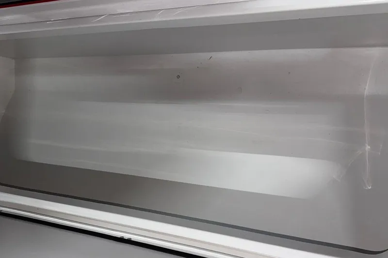 Slide: The Image of Empty storage compartment of a 2018 Mystic Powerboats M4200. - 15