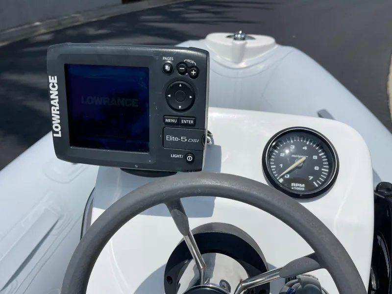Slide: The Image of 2013 AB Inflatables Lammina 10 AL boat dashboard with Lowrance Elite-5 DS GPS. - 10