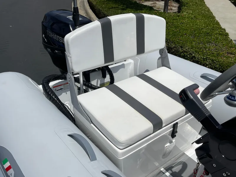 Slide: The Image of 2013 AB Inflatables Lammina 10 AL boat with Tohatsu outboard motor and white seating. - 15
