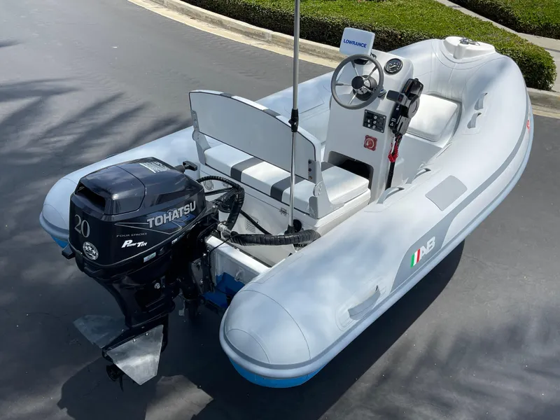 Slide: The Image of 2013 AB Inflatables Lammina 10 AL boat with Tohatsu 20 outboard motor. - 20