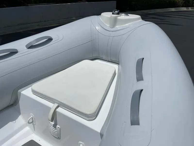 Slide: The Image of 2013 AB Inflatables Lammina 10 AL boat interior with seating and storage. - 7