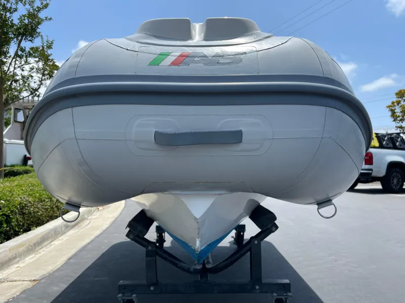 Slide: The Image of 2013 AB Inflatables Lammina 10 AL boat on trailer, viewed from the front. - 9
