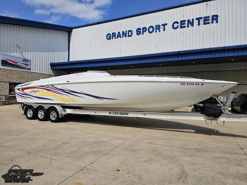 Slide: The Image of 2007 Baja 35 Outlaw boat on trailer at Grand Sport Center. - 13